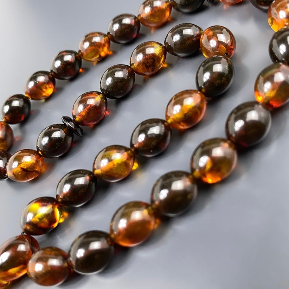 Damla Kehribar Tesbih Bernstein Buchstaben & Logo