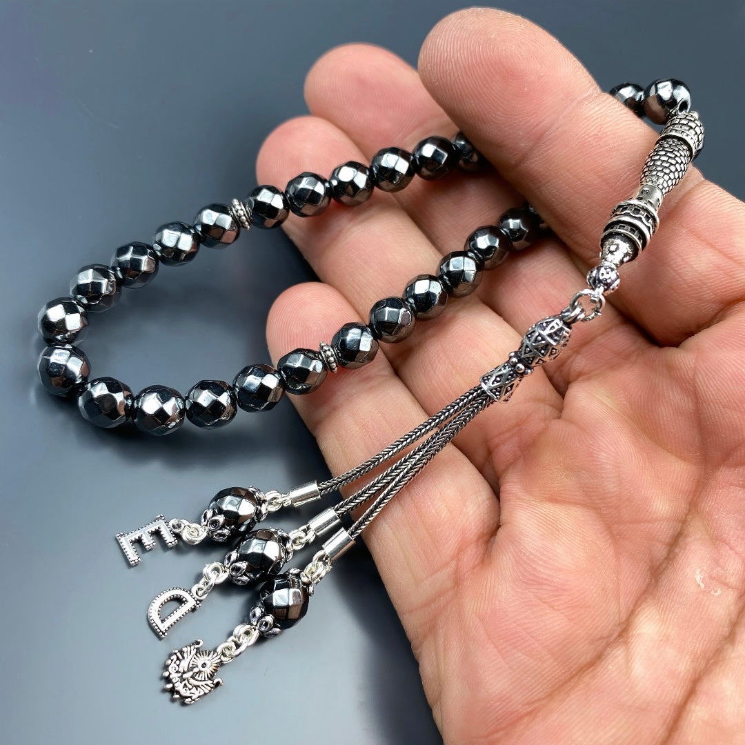 Tesbih Hematite facettiert 2 Buchstaben & Logo personalisiert 925 Silber