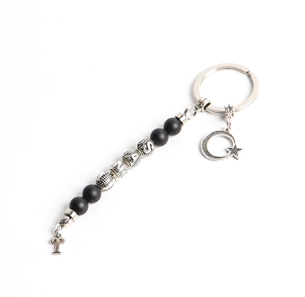 Schlüsselanhänger personalisiert mit Namen und einem Logo aus Natursteine perlen