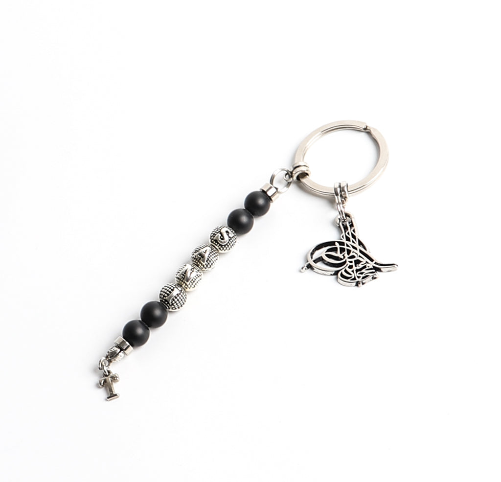 Schlüsselanhänger personalisiert mit Namen und einem Logo aus Natursteine perlen