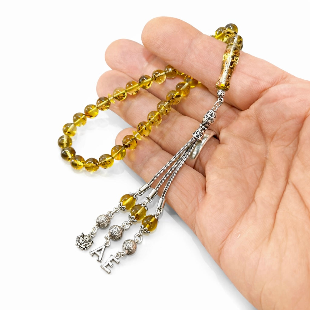 Bernstein-Tesbih (Kehribar) mit fein gearbeiteten Perlen und stabiler Quaste.
